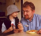 Rocky & Dad having pudding